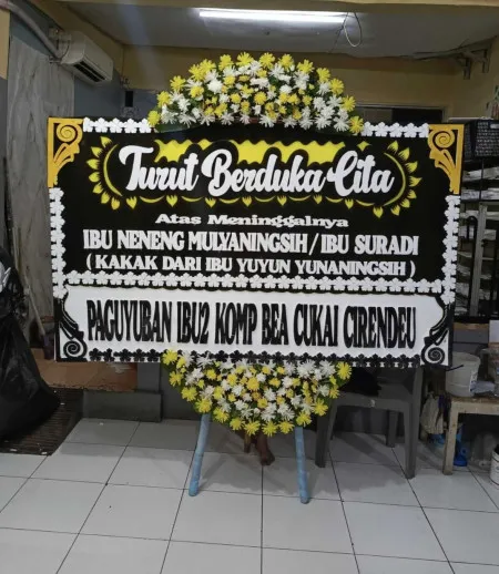 Papan Bunga Duka Stasiun Depok Baru